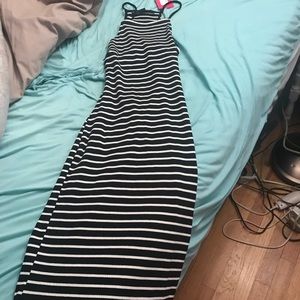 Never worn Mid length fitted dress. Open back.